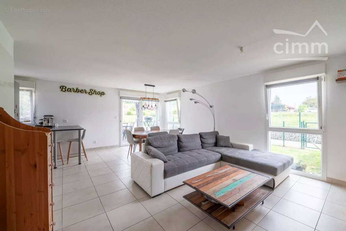 Dommartin t4 avec garage et jardin - photo 3