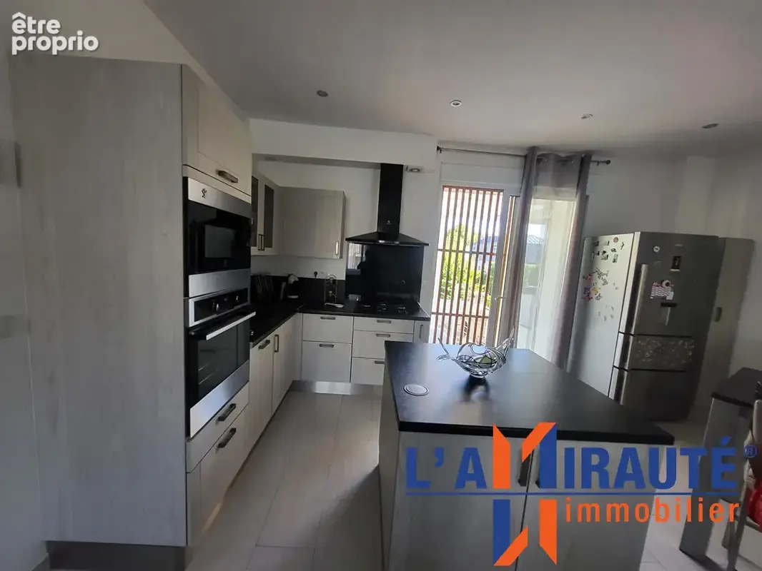 Maison 116 m² 3 chambres - photo 2