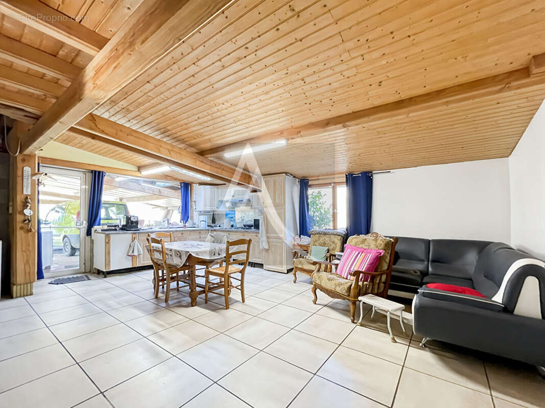 Maison en bois massif idéale pour diverses activités ! - photo 8