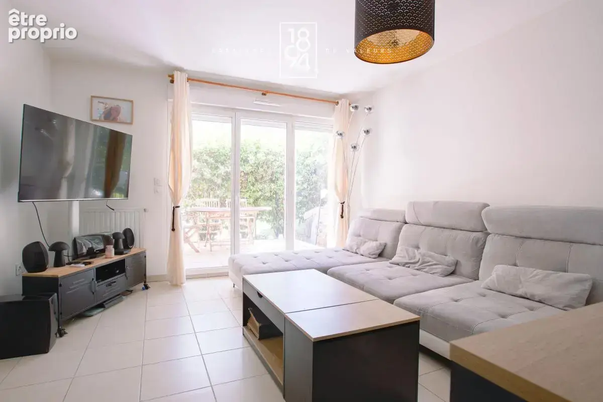Appartement T2 en rez de jardin , parking double et cave - photo 7