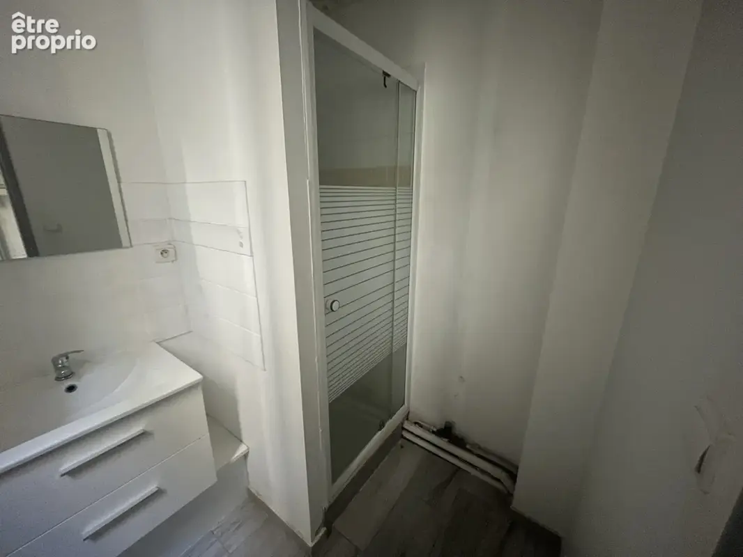 Immeuble avec 9 appartements et un local commercial - photo 8