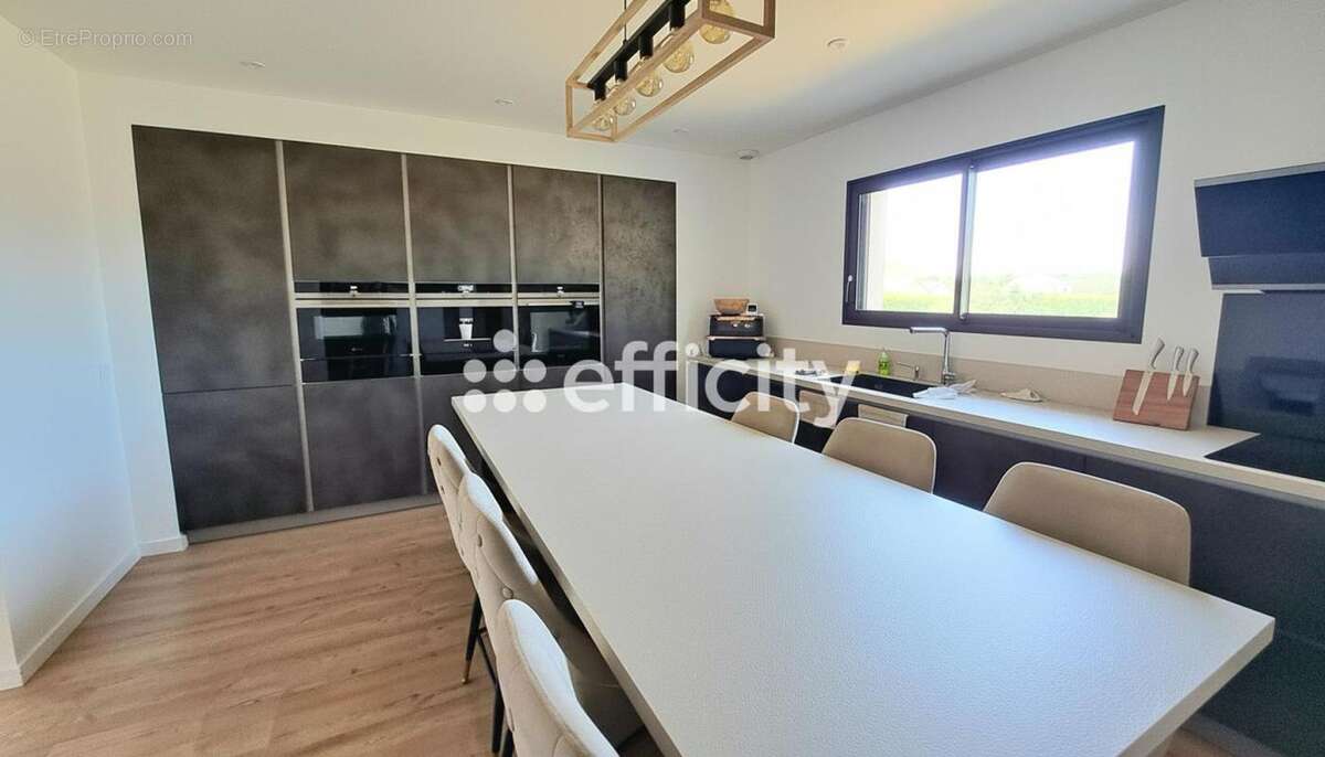 Maison 150 m² à Artigueloutan  - photo 9