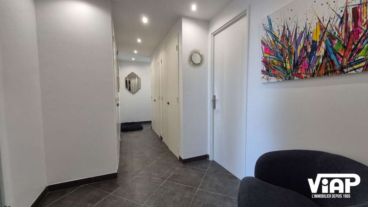Appartement en Excellent état avec terrasses et garage - photo 9