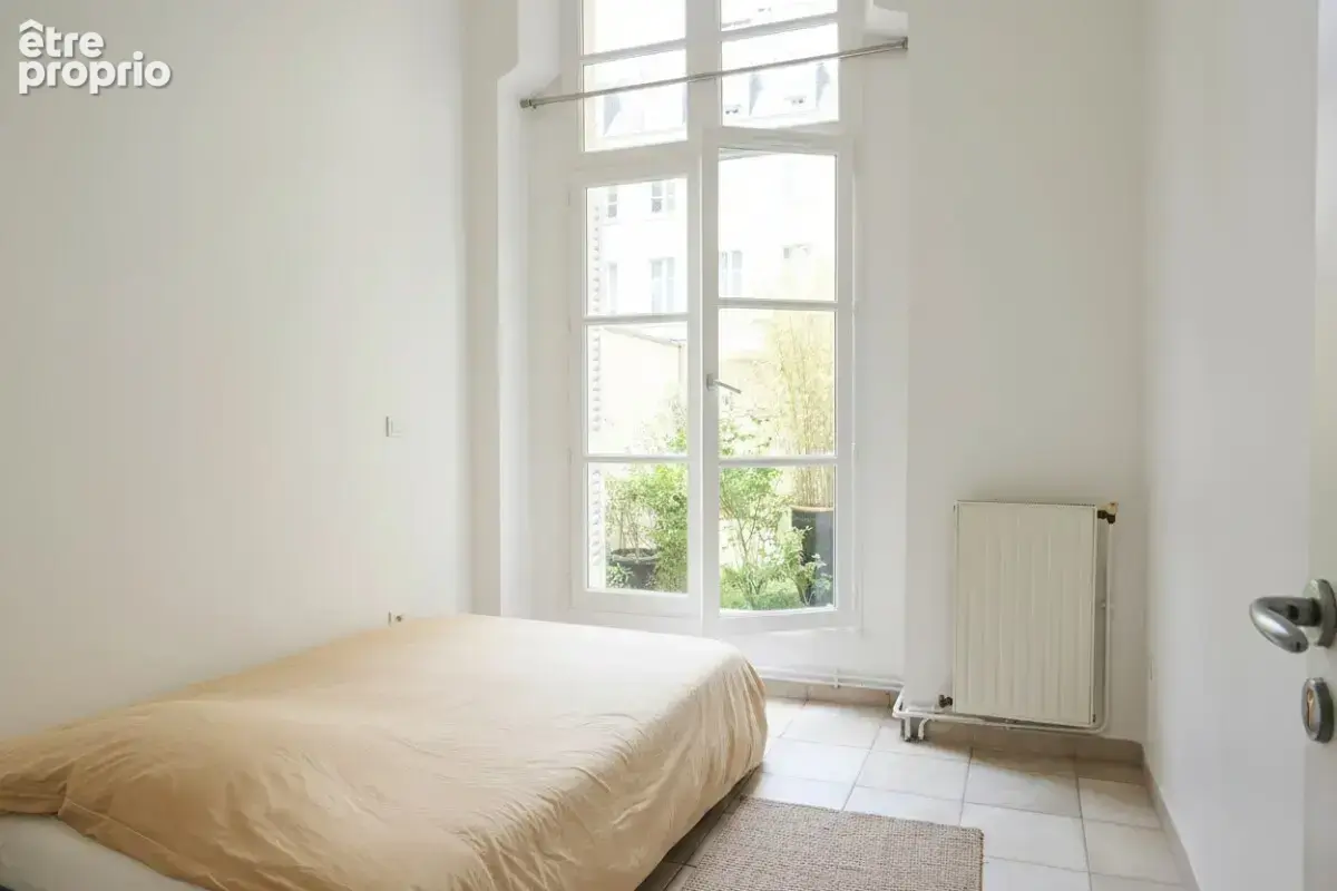Appartement - Paris 11ème - 2 pièces - 54m² - photo 2