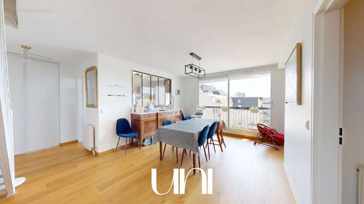 Appartement 5 pièces de 98 m2 avec caves, balcon, ascenseur et parkings - CAEN Saint-Gilles - photo 11