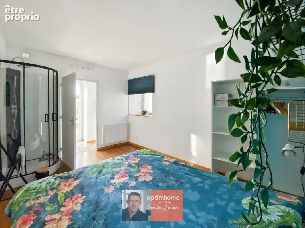 DOLE – Appartement duplex 85 m² – beaux volumes, parking et grande cave - photo 10