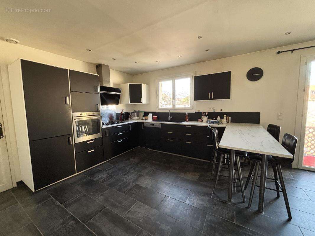 Maison T7 de 136 m2 - photo 6