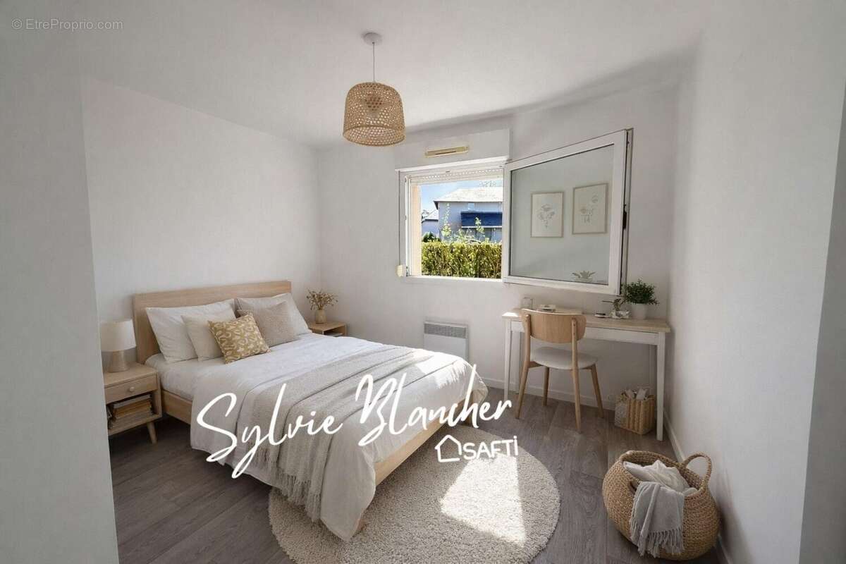Photo 4 - Appartement à HEROUVILLE-SAINT-CLAIR