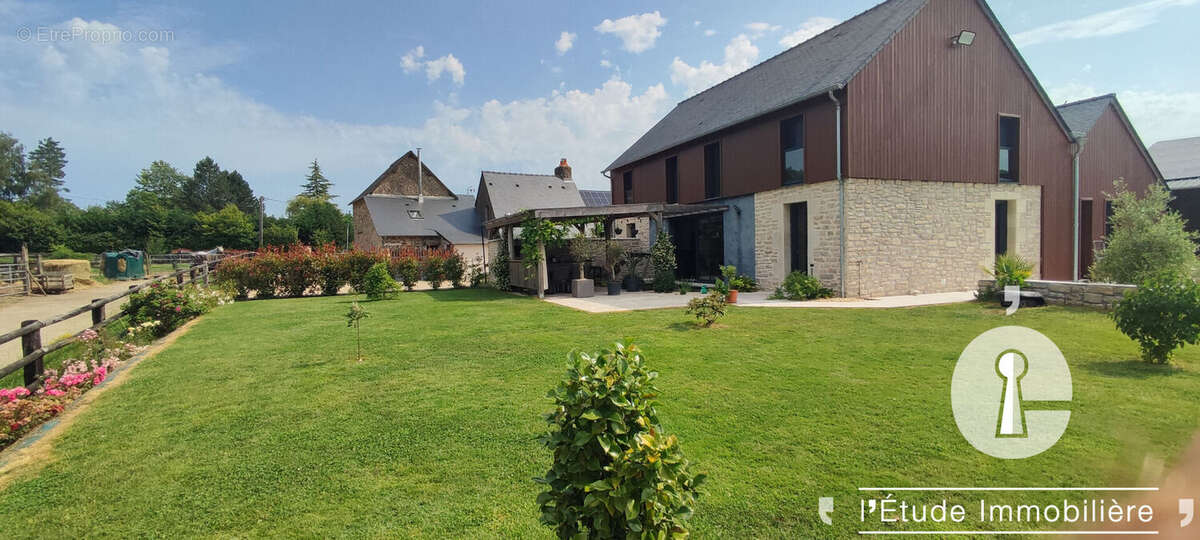 Maison Saint Ouen Des Toits 9 pièce(s) 189 m2 + 6 gîtes (132 m²) - photo 3