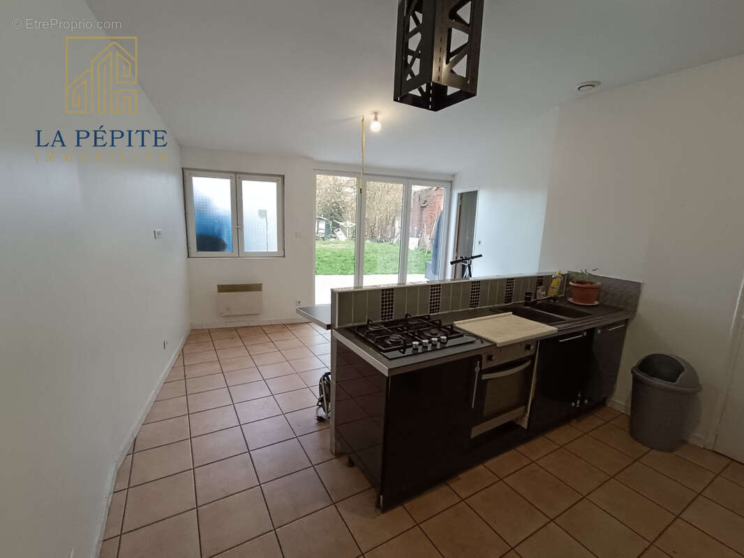 Maison à FRESNES-SUR-ESCAUT