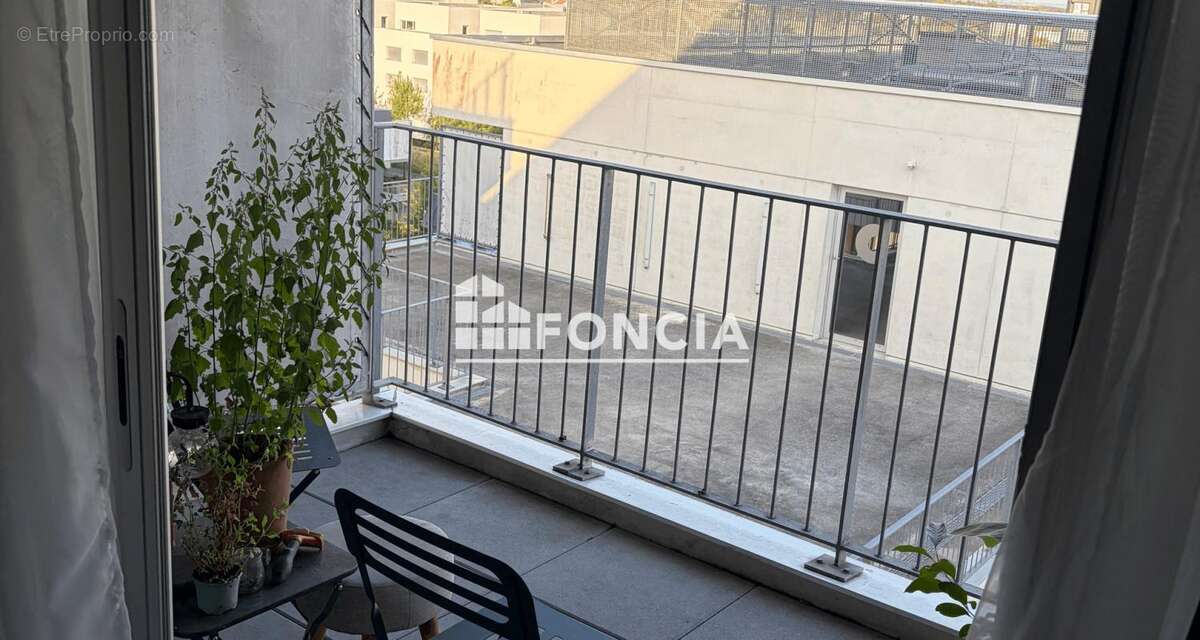 T2 avec terrasse et stationnement sécurisé - photo 2