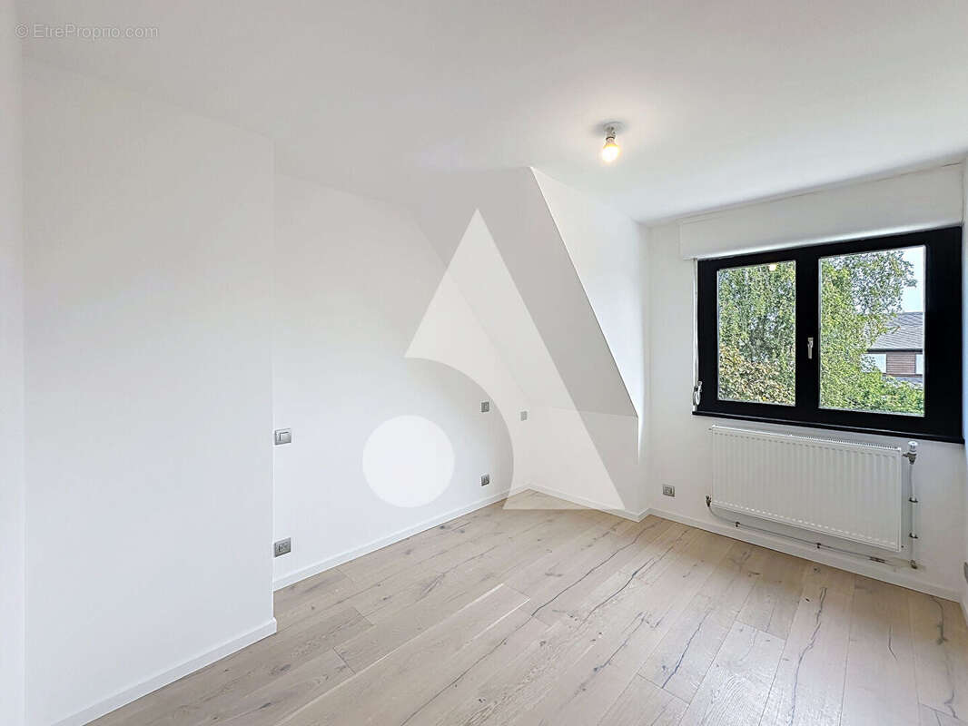 Maison à AULNOY-LEZ-VALENCIENNES