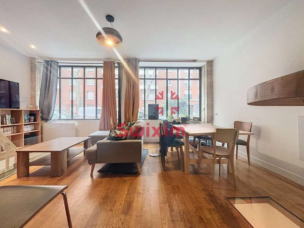 3472849_896983_photo_1.jpg - Appartement à PARIS-11E