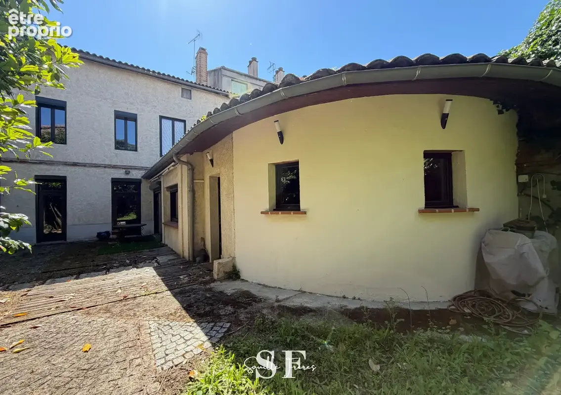 Castelsarrasin - maison de ville avec garage et jardin - photo 2