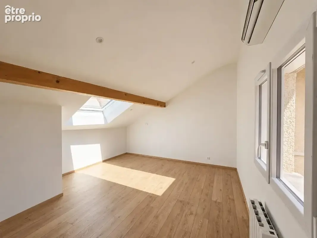 A vendre appartement duplex T4 climatisé centre-ville BELLEY. - photo 3