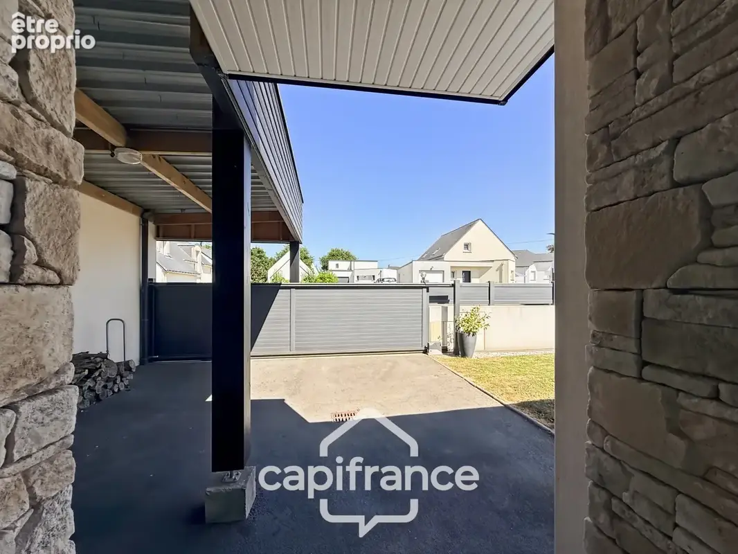 Maison contemporaine de plain-pied de 160 m² – 4 chambres – Véranda de 27 m² avec spa – Double garage – Carport – Noyal-Pontivy - photo 27