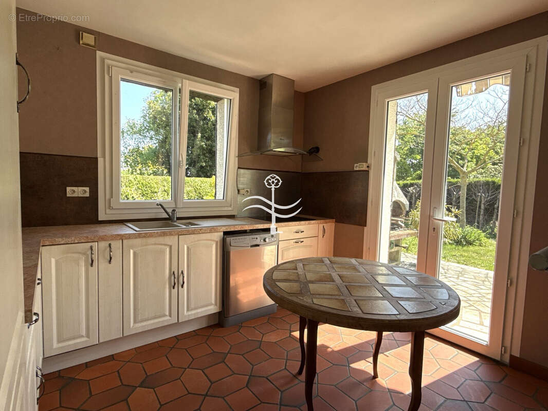 Maison à CORMELLES-LE-ROYAL