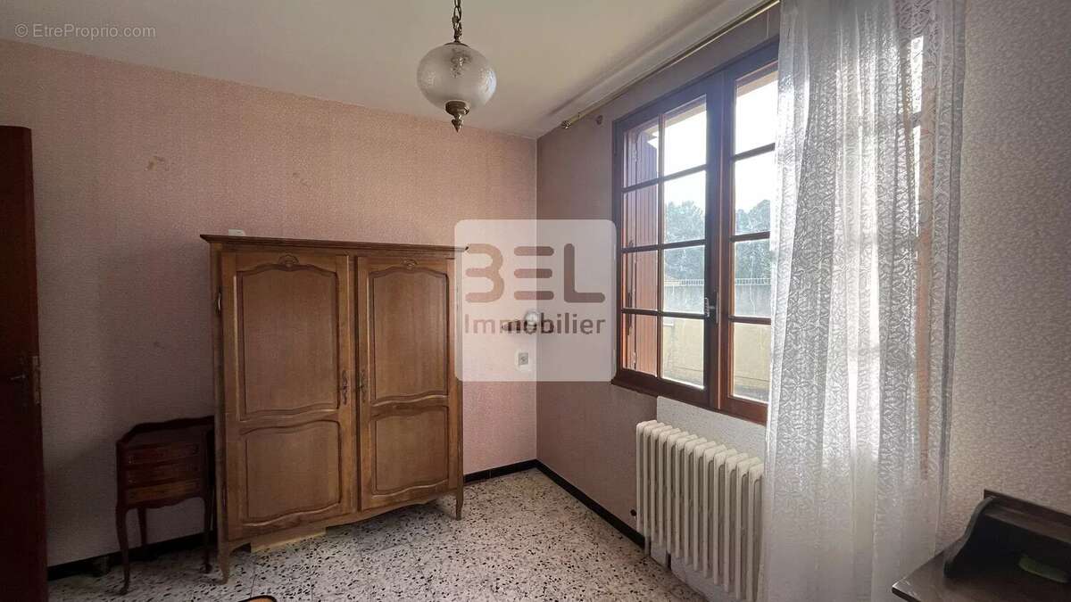 Maison à LAUDUN-L'ARDOISE