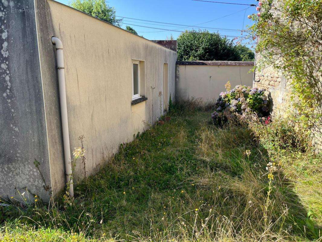 Maison à CONDE-SUR-SARTHE