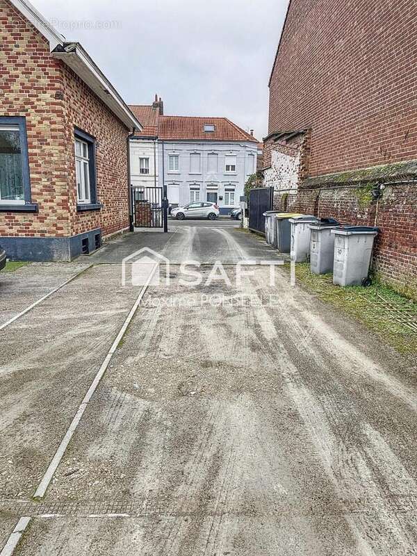 Photo 2 - Parking à SECLIN