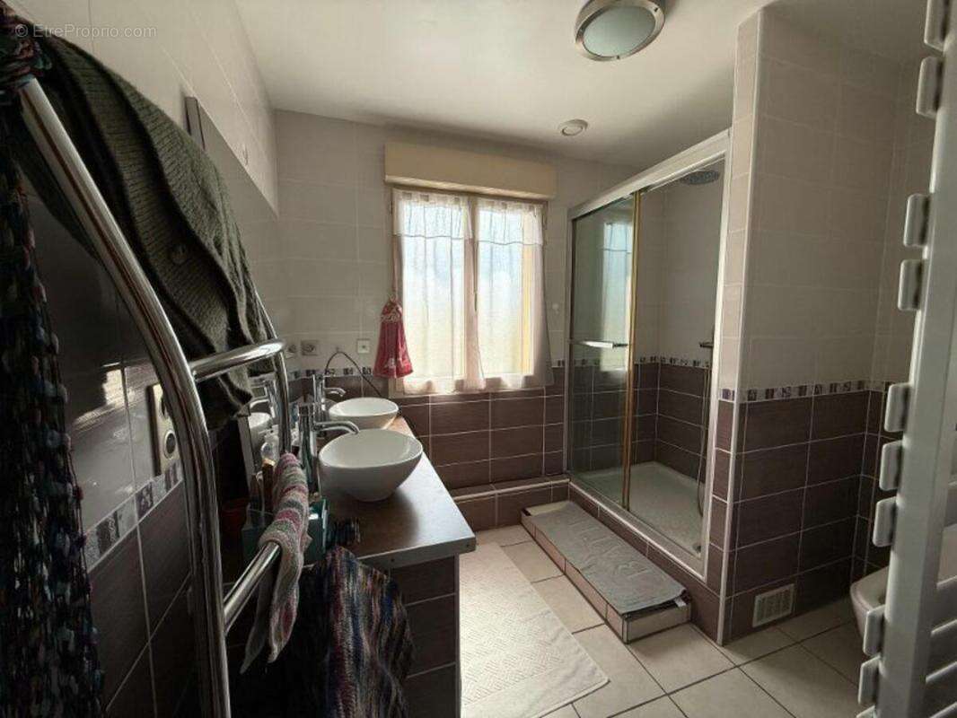 Maison 161 m² à Lindry  - photo 11