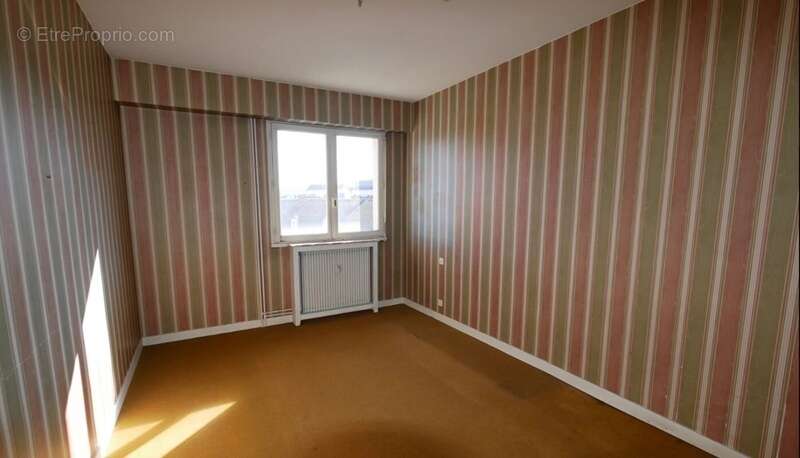 Appartement T5 de 100 m² avec balcon, ascenseur, cave et stationnement – Fort potentiel à Limoges - photo 5