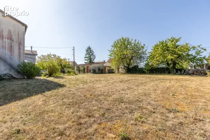 Naves 03330 -maison pierre-terrain- garage-atelier 119 000 euros fai - photo 11