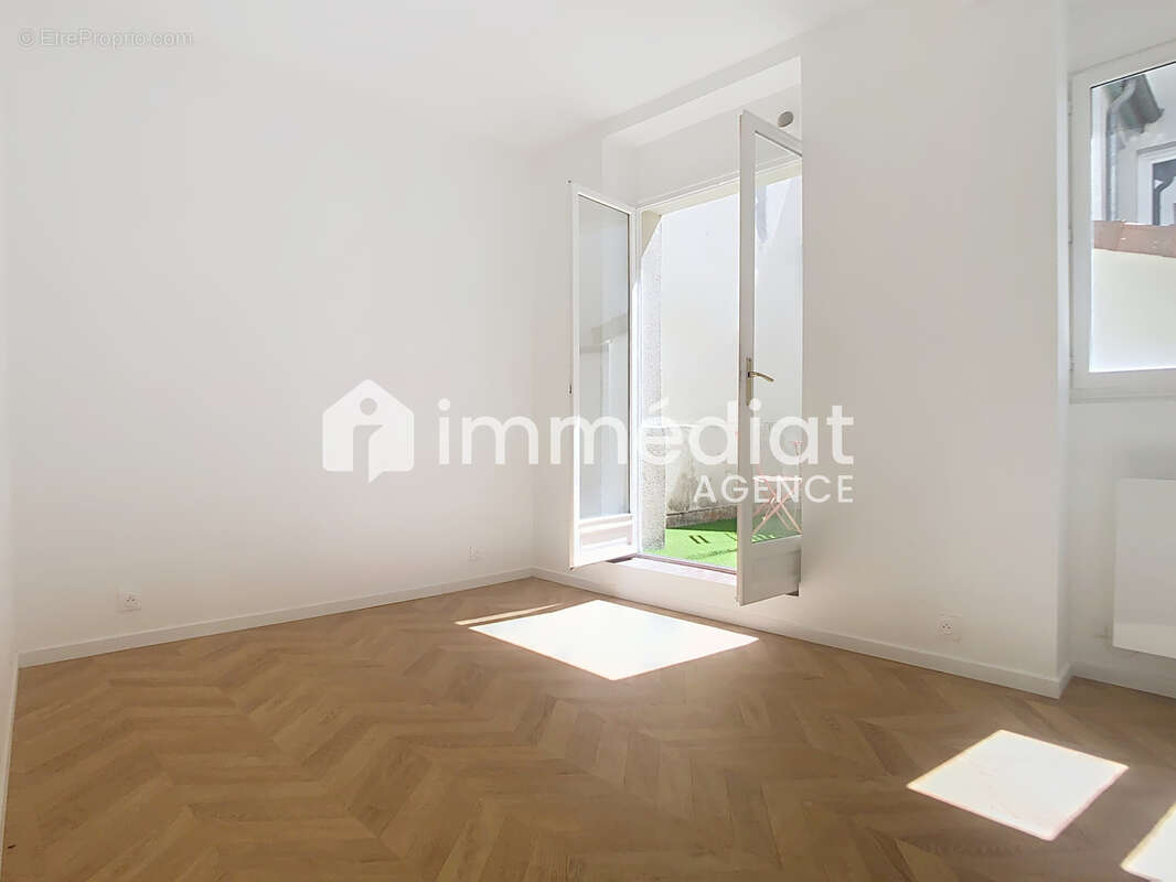 Deux pièces, terrasse 25m2, centre-ville - photo 4