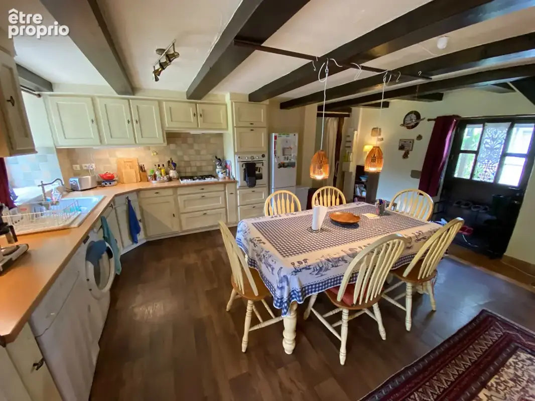 EXCLUSIVITÉ - Secteur de Broons : Maison de charme, à deux pas du lac, jardin arboré, cachet rustique, 120 m² habitables - photo 4