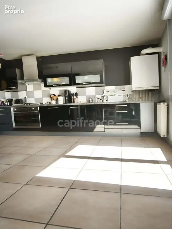 Appartement T4 de 84 m² double terrasse, garage et cave - photo 8