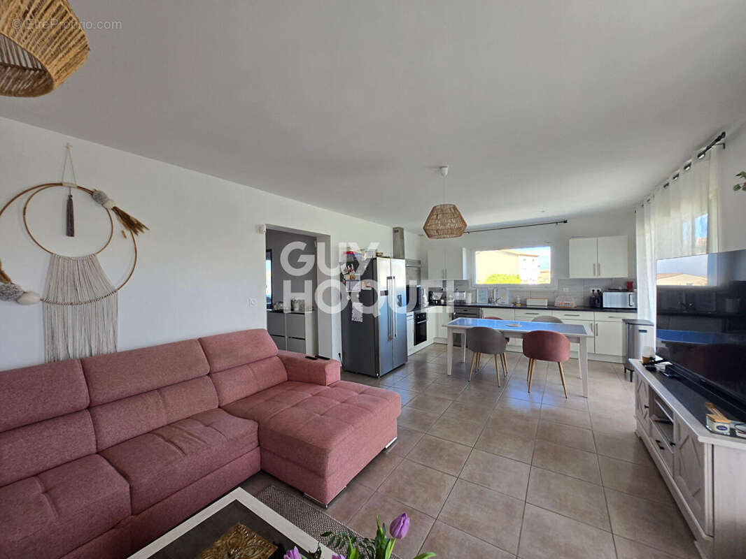 Maison à LAUDUN-L'ARDOISE