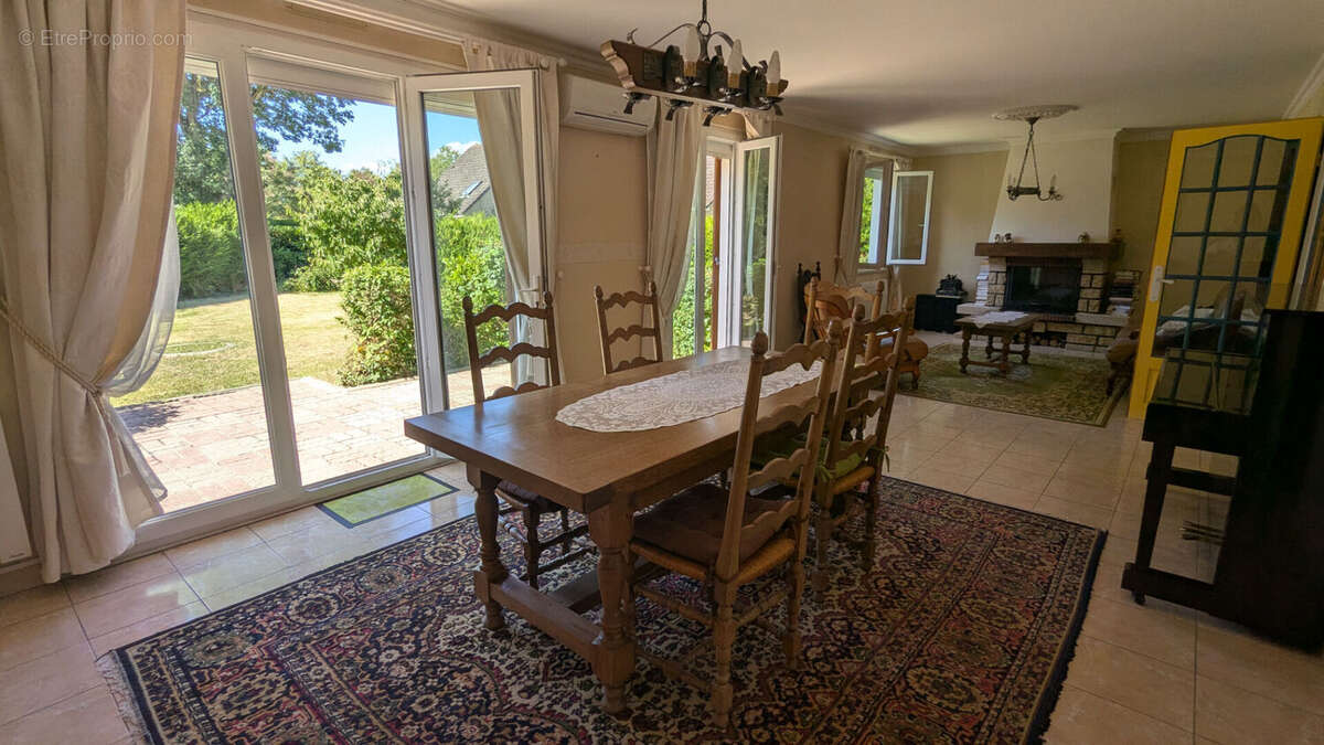 Maison de plain-pied 128 m² avec jardin à Val-de-Reuil 4 chambres - photo 2