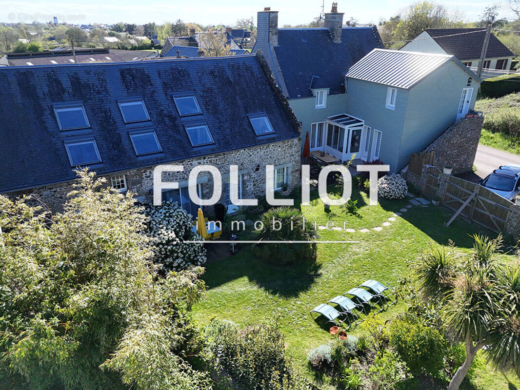 Maison à AGON-COUTAINVILLE