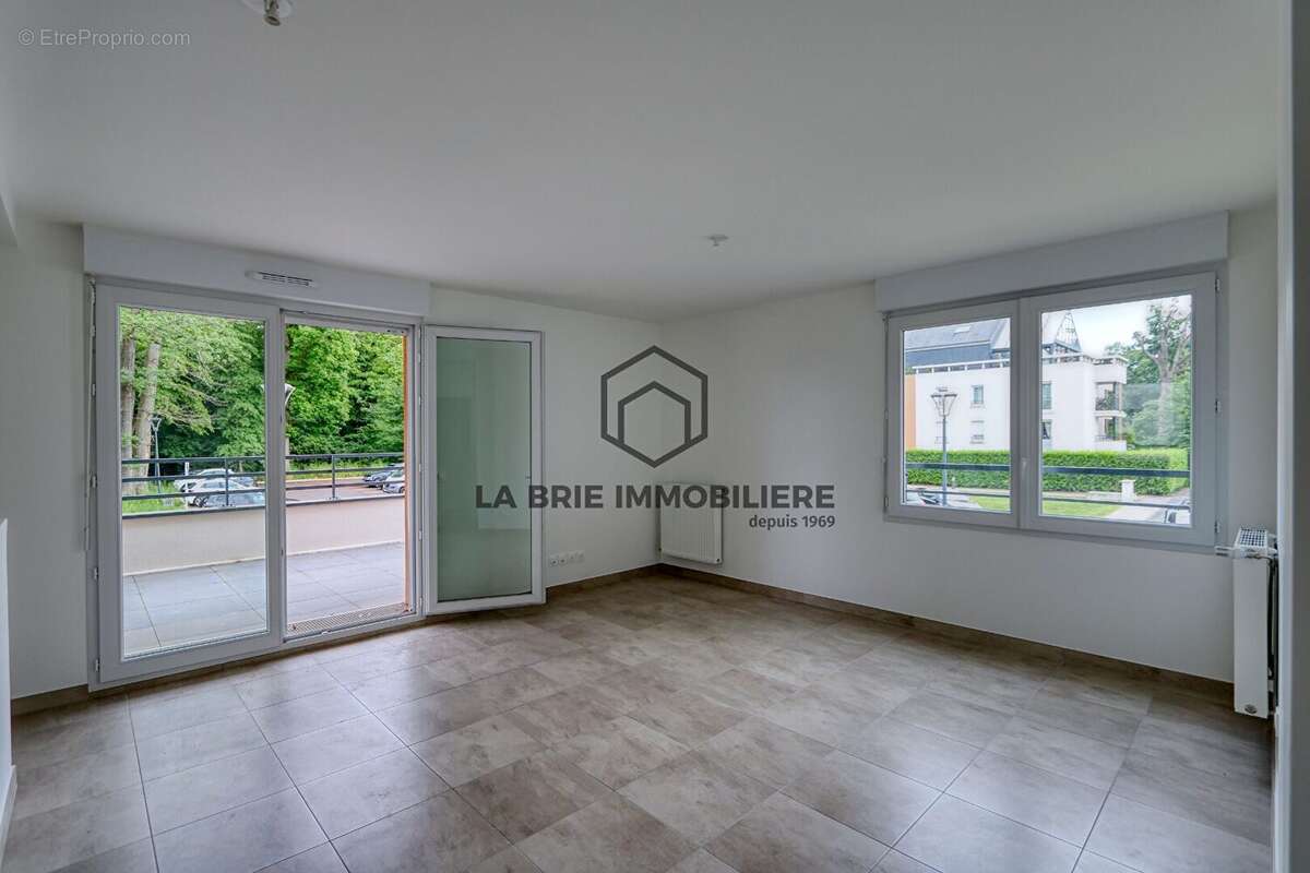 Appartement 4 pièces 70 m² à vendre à Emerainville (77184) - photo 2