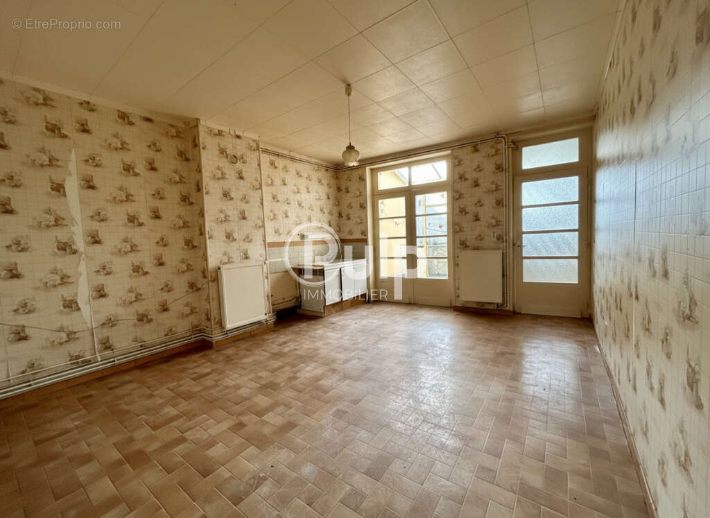 Maison mitoyenne partiellement rénovée - 122 m² - 4 chambres - Inchy-en-Artois - photo 4