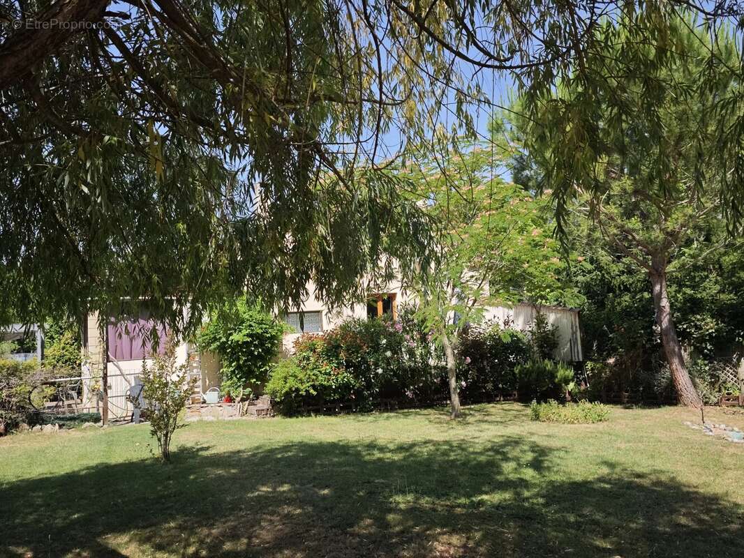 Maison individuelle avec garage et grand jardin - photo 2