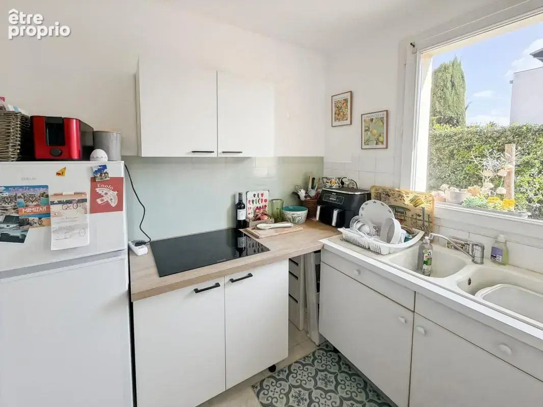 Appartement à vendre T2 situé en rez-de-jardin de 50 m² avec Jardin Privatif & Garage + climatisation - photo 11