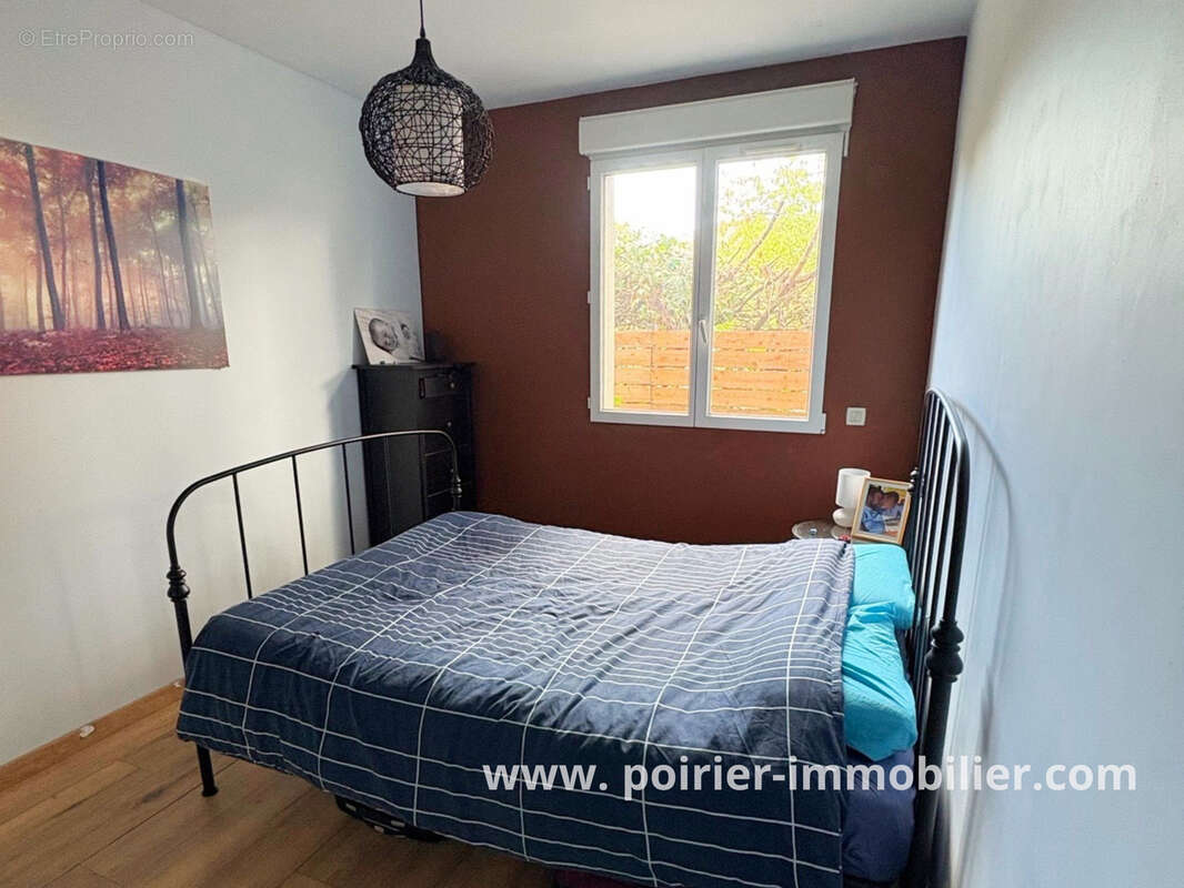 Appartement t3 en rez de jardin - photo 5