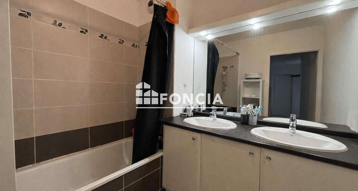TOULOUSE - Appartement T4 - Box et place de parking en sous sol - photo 4