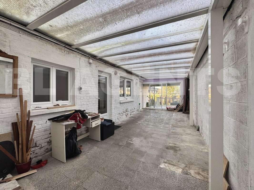 * véranda - Maison à SOMAIN