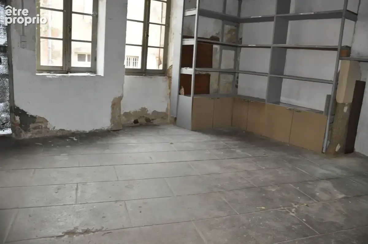 Immeuble de caractère en centre-ville, avec local commercial, duplex et appartement loué - photo 11