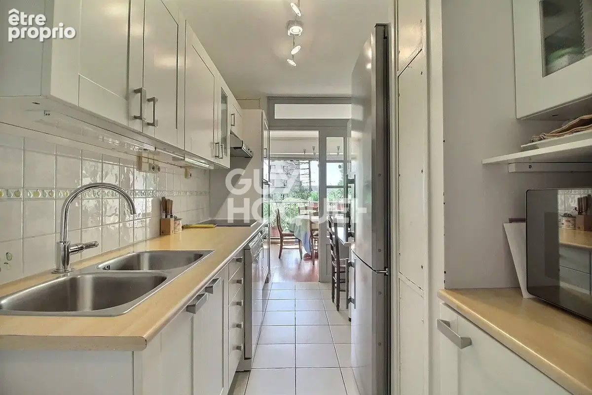 Appartement 4 pièces de 94 m² en rez-de-jardin - photo 7