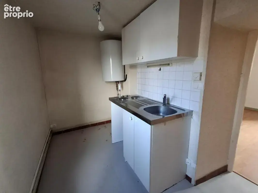 Immeuble de rapport : local + appartement en duplex - photo 5
