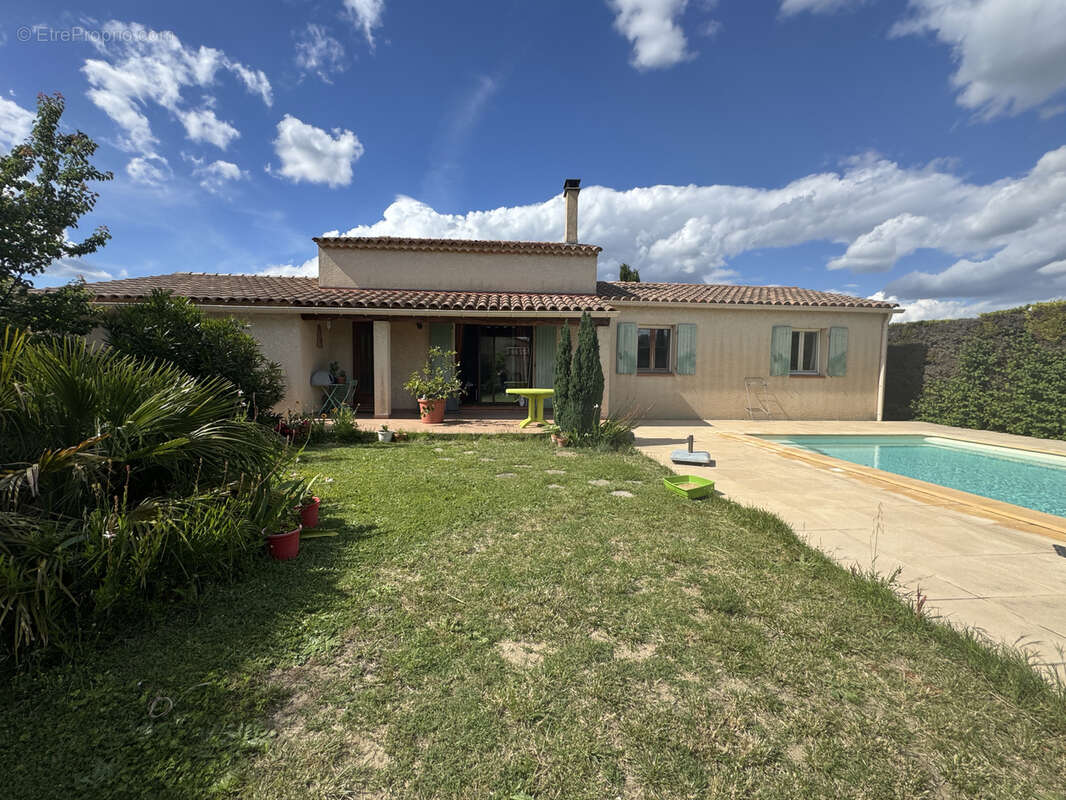 Maison à LAUDUN-L'ARDOISE