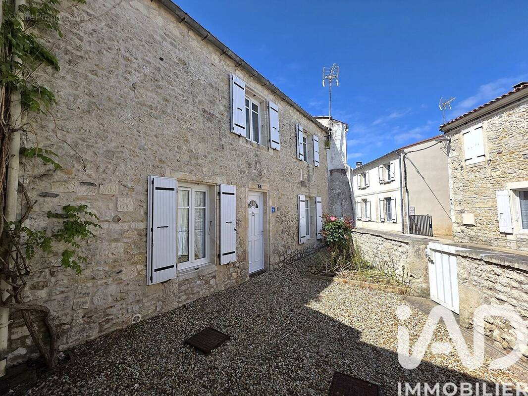 Photo 1 - Maison à BOURCEFRANC-LE-CHAPUS