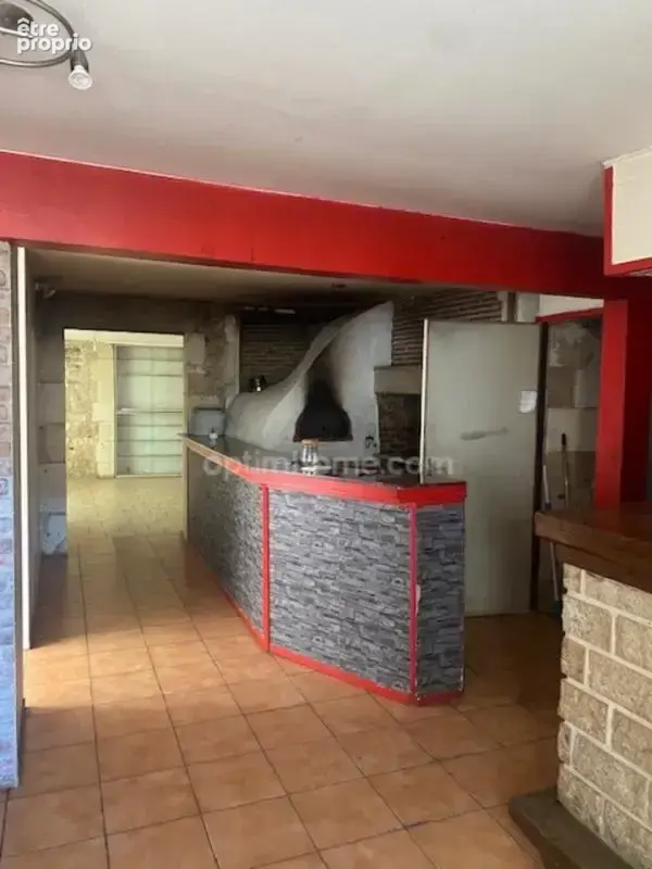 Au cœur du village de Marthon, Bâtiment en pierres, ancien commerce, bar pizza,  avec logement au dessus - photo 3
