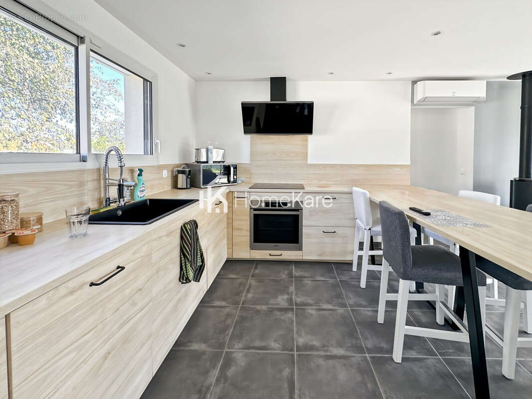 Maison 90 m² à Cazeres  - photo 2