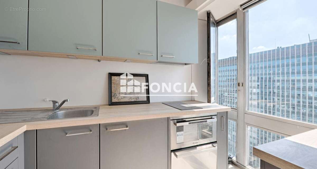 Montparnasse : studio de 31m2 en etage eleve avec ascenseur - photo 2
