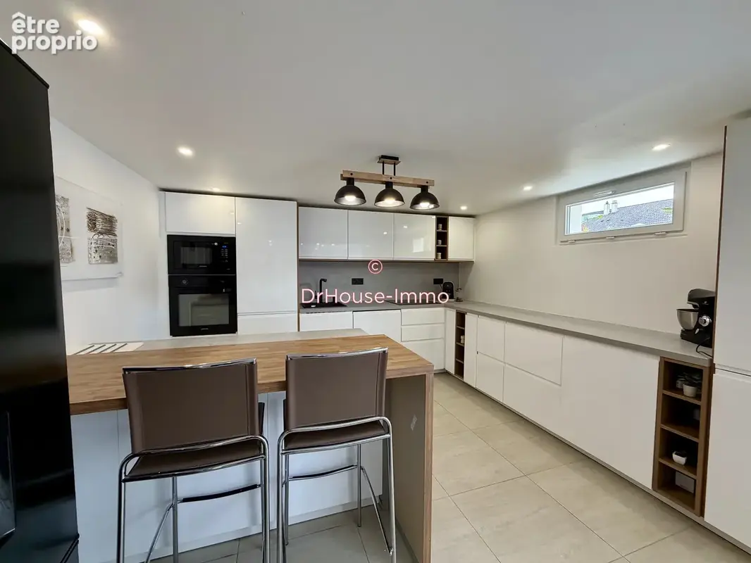 Maison 8 pièces 145 m² à vendre à Amilly (45200) - photo 8