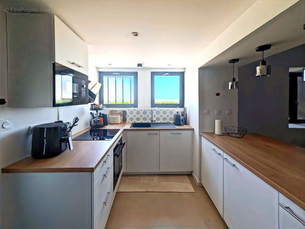 Maison 74 m² à Anse  - photo 5